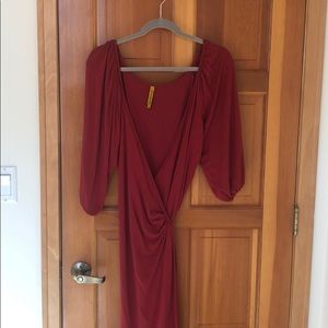 Burgundy wrap dress with flouncy sleeves